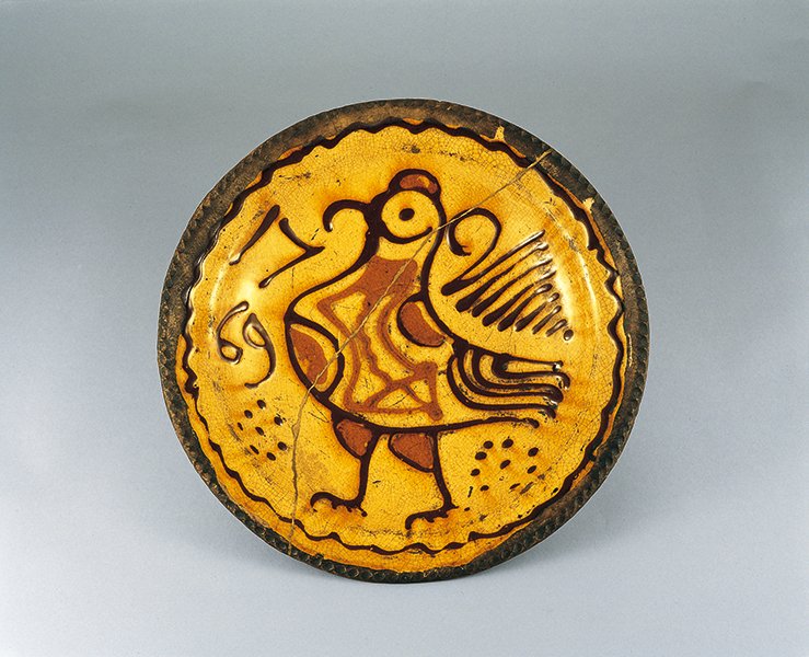 Bowl, stoneware, slip trailing bird motif (Britain)
